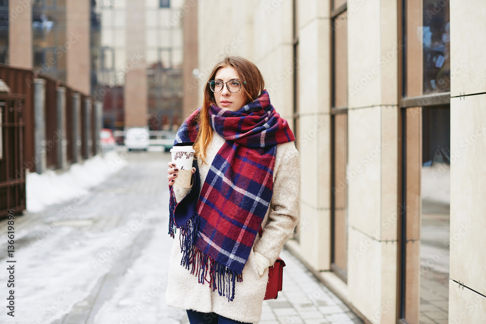 Fototapeta premium Girl with coffee winter street style