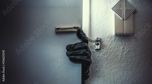 burglar open door of apartment or house photo