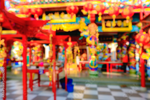 Blurred red Chinese joss house background. traditional architect