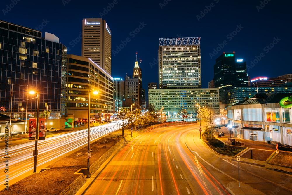 Light Street and the skyline of downtown at night, in Baltimore,