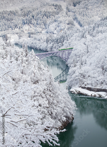 Japan mountain and snow with local train in winter season at Mishima town , Fukushima prefecture