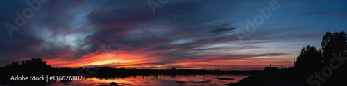Beautiful sunset sky with clouds,panorama shoot © sutadimages