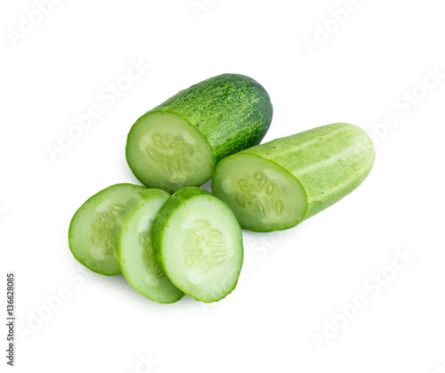 Fresh cucumber slices on white