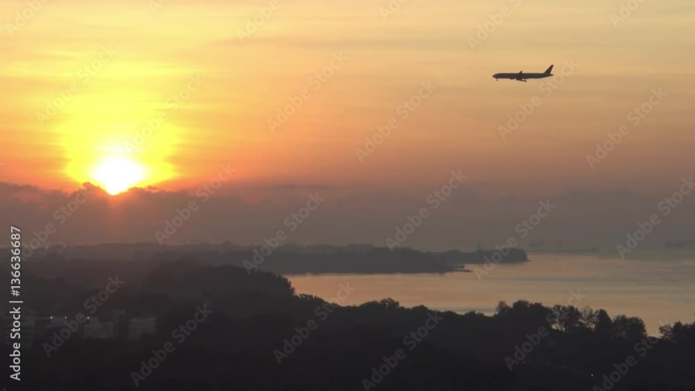 4k Aerial view of east coast park with plane flying in the sunset at Singapore-Dan 4k Aerial view of east coast park with plane flying in the sunset at Singapore-Dan