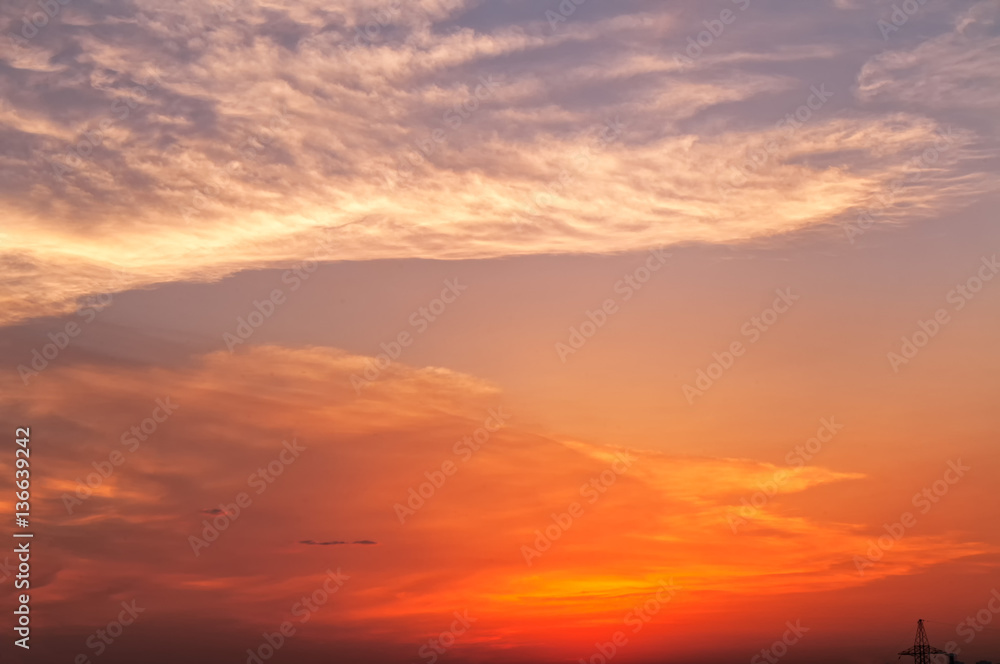 Bright sunset with dramatic cloudscape background
