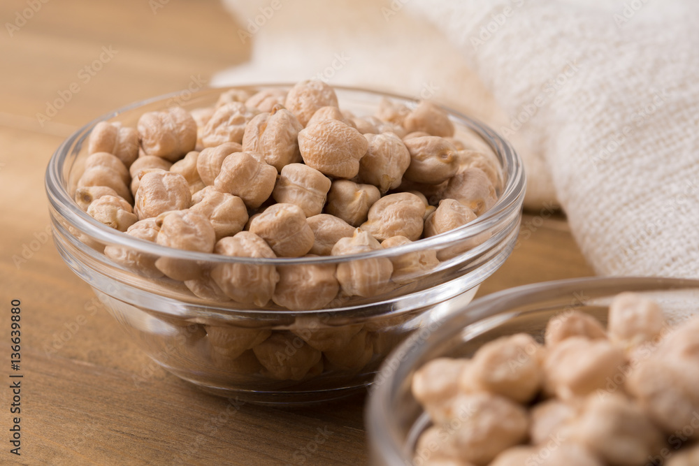 Garbanzo beans or chickpeas in a glass bowl with copy space. Garbanzo beans or chickpeas in a glass bowl with copy space.