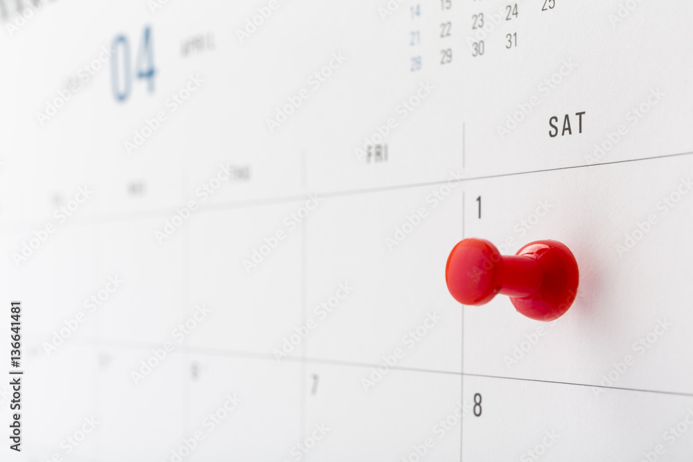 calendar for April with the First day ringed in pin, Fools day concept. calendar for April with the First day ringed in pin, Fools day concept.