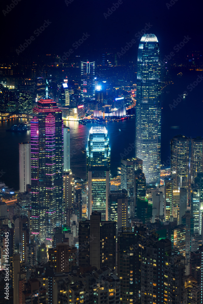 Naklejka premium elevated view of night scene of Hong Kong victoria harbor,China.