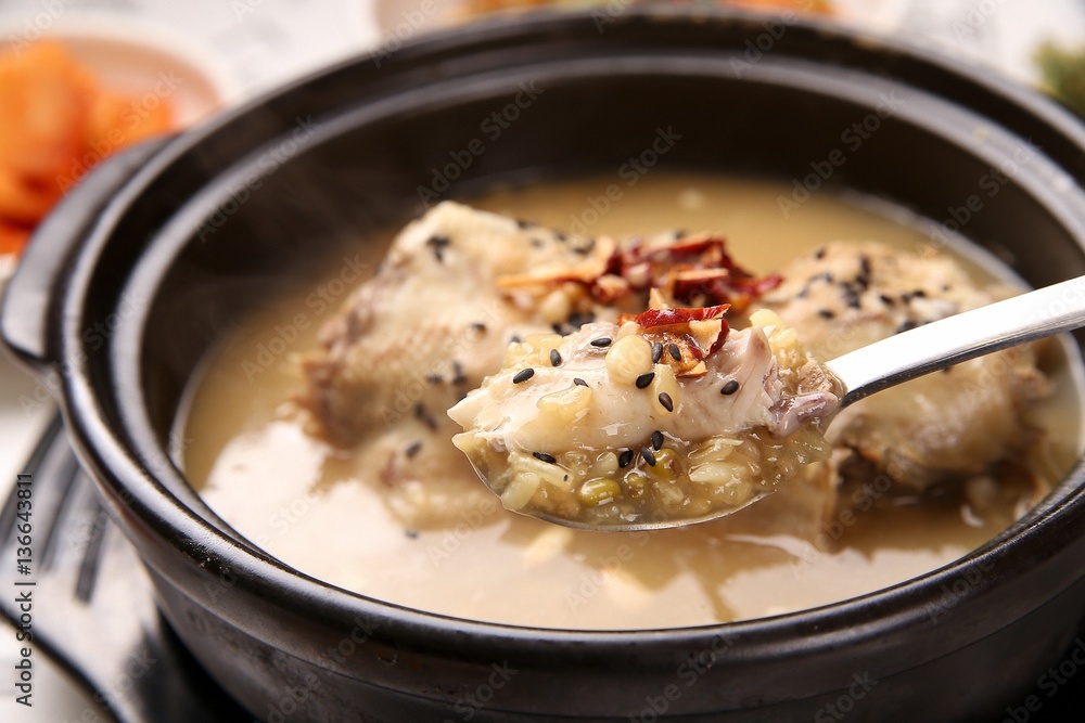red ginseng chicken soup. hongsam samgyetang red ginseng chicken soup. hongsam samgyetang