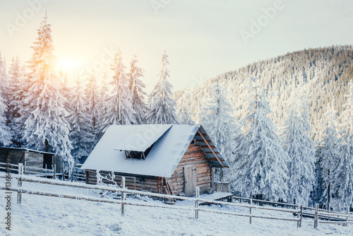 cabin in the mountains in winter 