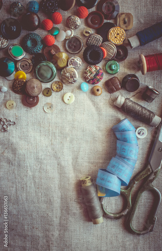 Scissors for cutting fabrics,patterns, fabrics,threads and buttons. Selective focus.  photo