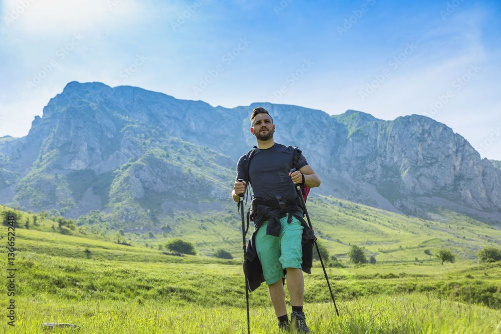 Man Hiking in Green Mountains