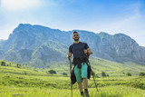Man Hiking in Green Mountains