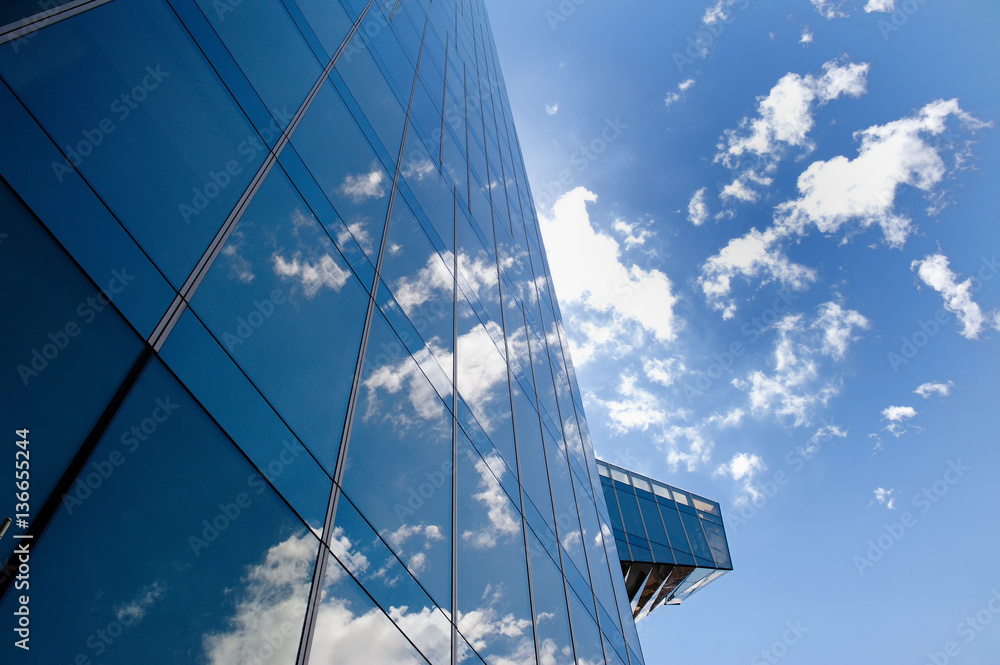Naklejka premium Business office building, clouds and sky in Barcelona, Spain