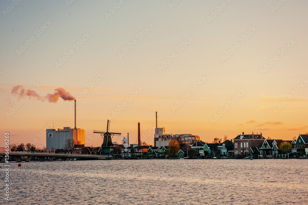 Sunset over the mill. Rotterdam. Holland.