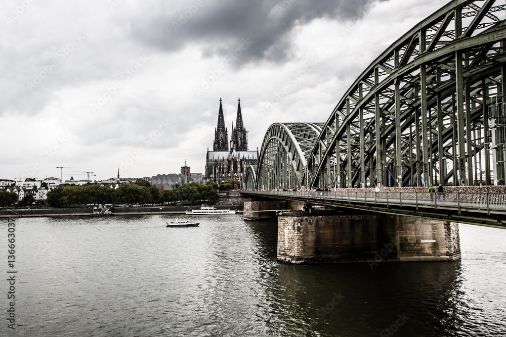 Hohenzollern Bridge, the Cologne Cathedral and the river rhine in Cologne, Germany