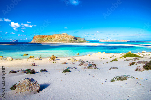 Fototapeta Naklejka Na Ścianę i Meble -  Amazing panorama of Balos Lagoon with magical turquoise waters, lagoons, tropical beaches of pure white sand and Gramvousa island on Crete, Greece