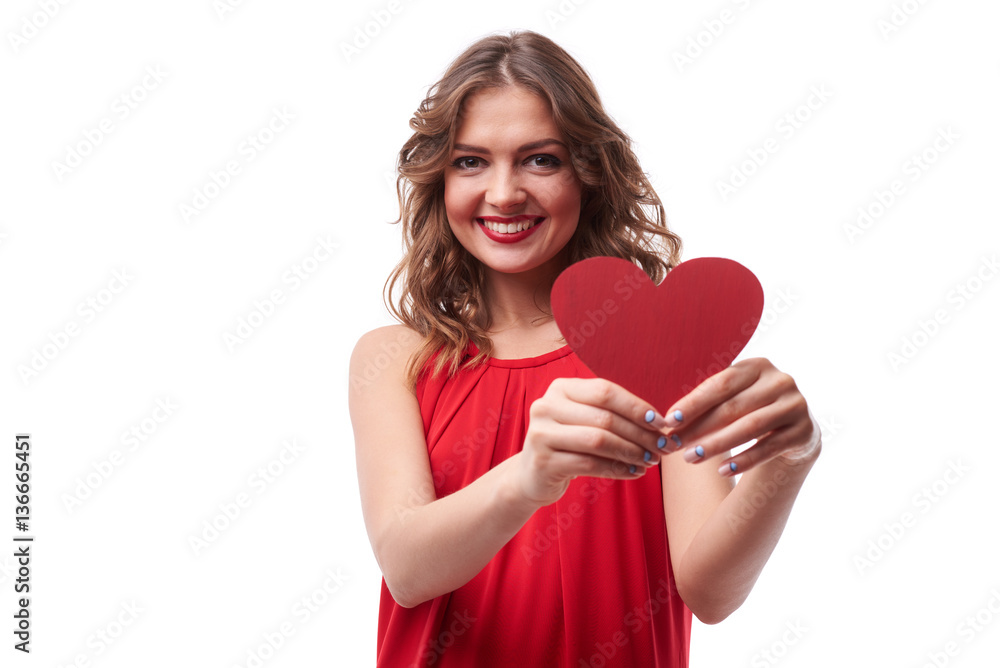 Curled brunette in red dress giving a valentine card to you Curled brunette in red dress giving a valentine card to you