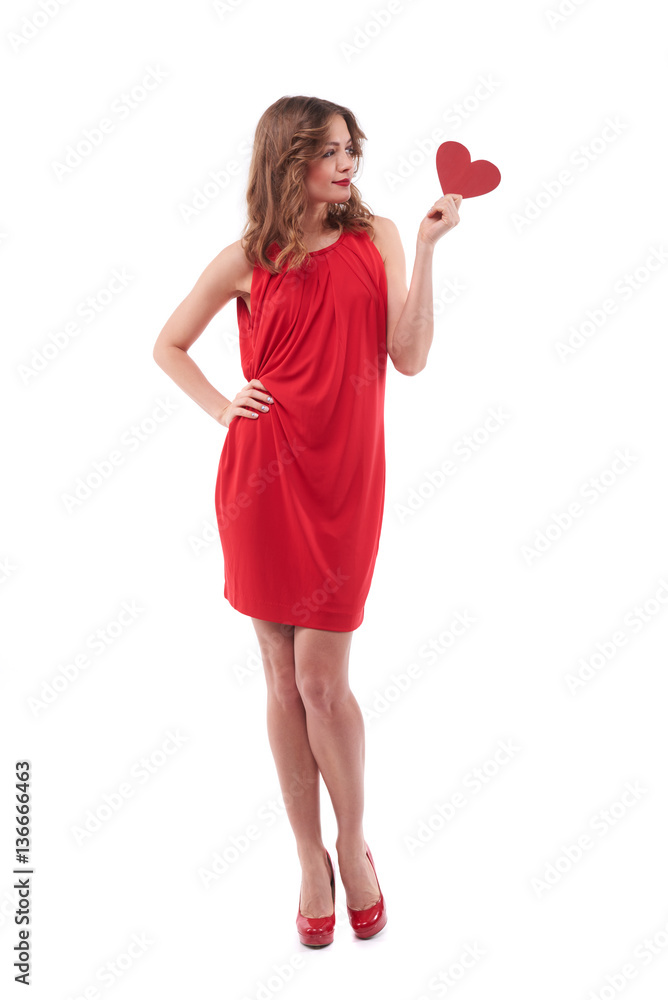 Slim pensive woman looking at the valentine card Slim pensive woman looking at the valentine card