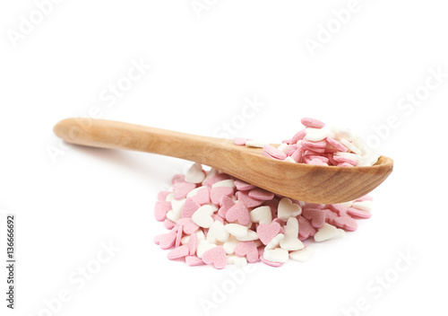 Spoon full of sprinkles isolated