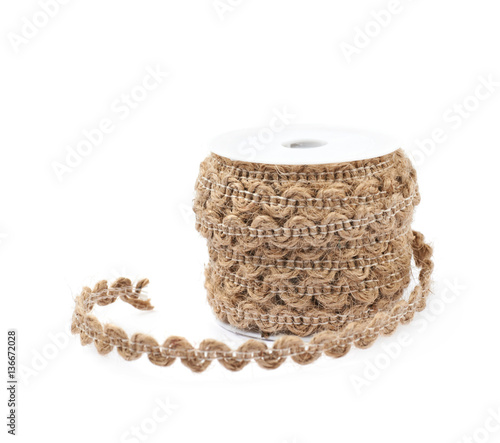 Decorational rope string on a bobbin