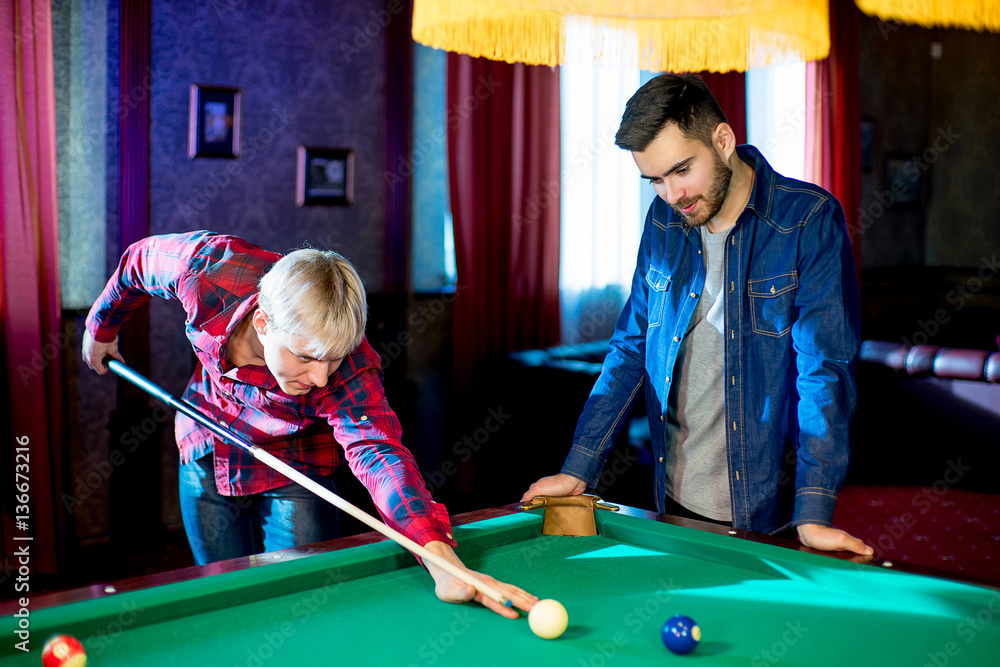 Fototapeta premium two men playing billiard