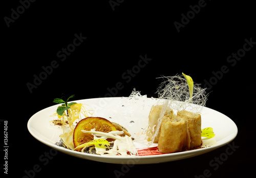 Rolled pancakes with poppy seed photo