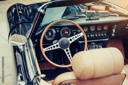 Luxury car interior. Beautiful retro style transport exhibition.