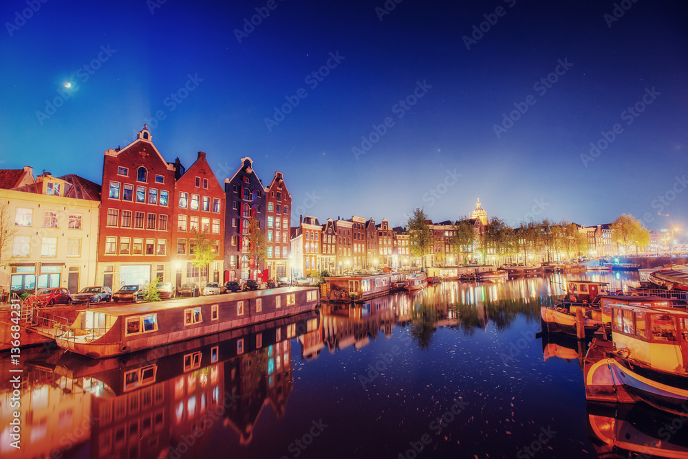 Evening city. Highlighting buildings and streets Amsterdam, the 
