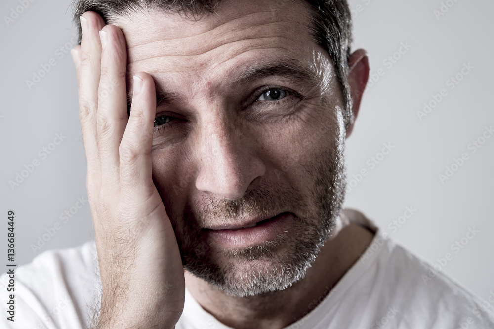 man with blue eyes sad and depressed looking lonely and suffering depression feeling sorrow man with blue eyes sad and depressed looking lonely and suffering depression feeling sorrow