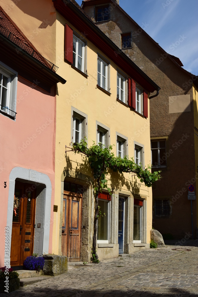 Obraz premium View in the historical town of Rothenburg on the Tauber, Bavaria, region Middle Franconia, Germany