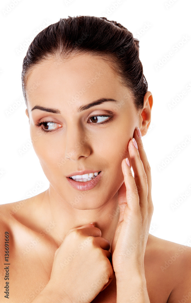 Beautiful face of young woman with clean fresh skin. Beautiful face of young woman with clean fresh skin.