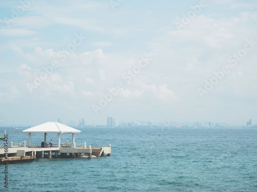 concrete pier on sea/ocean with blue sky background in Thailand. © sky1991