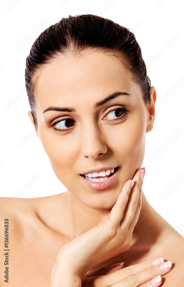 Beautiful face of young woman with clean fresh skin. Beautiful face of young woman with clean fresh skin.