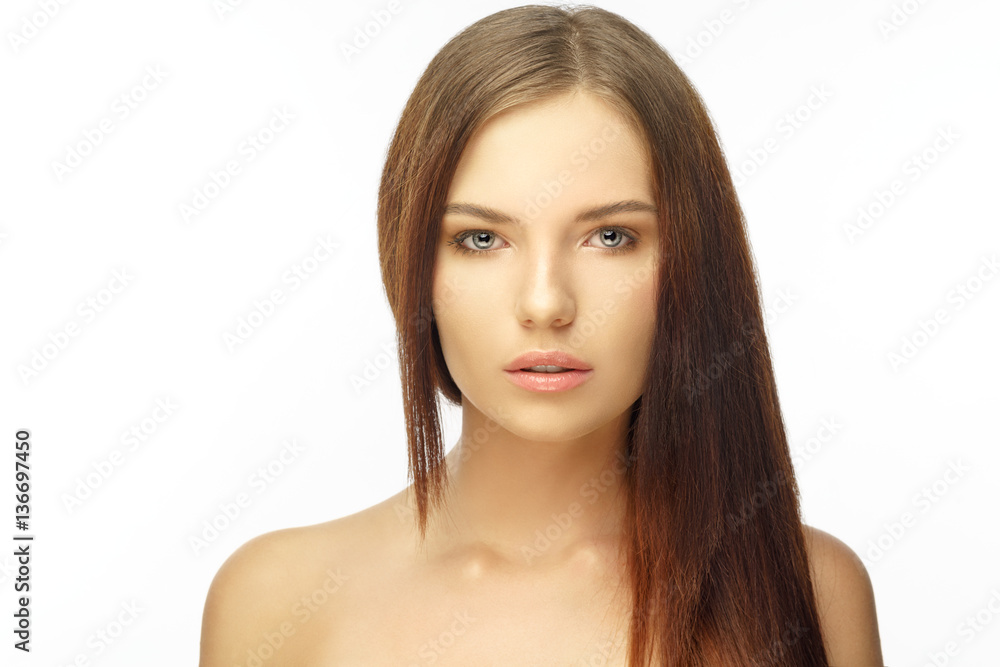 Beautiful young female face. Studio shot. Beautiful young female face. Studio shot.