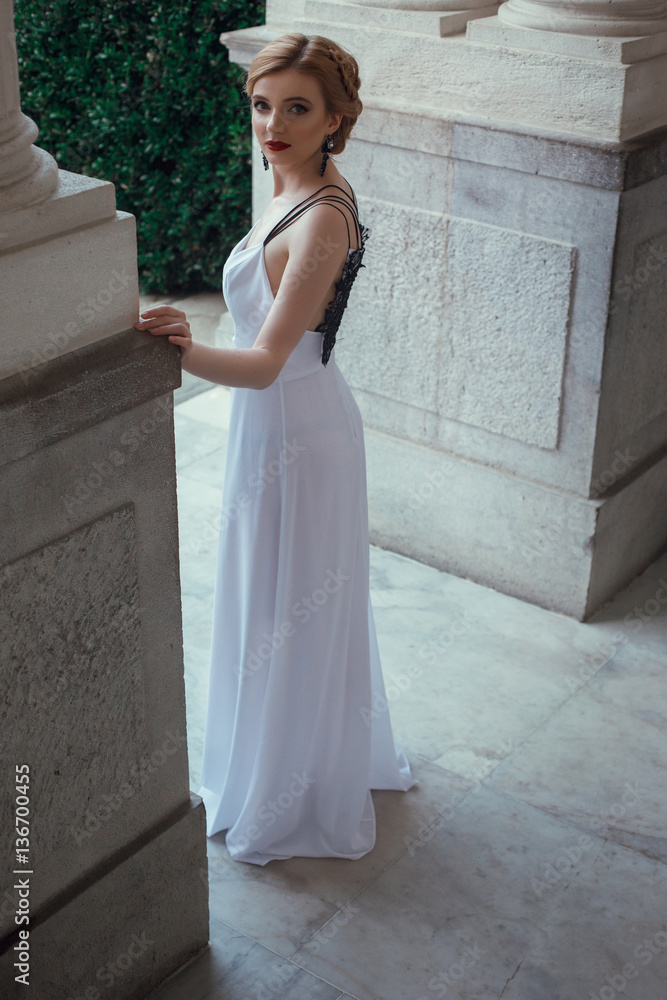 Fototapeta premium Beautiful woman posing long dress in Livadia
