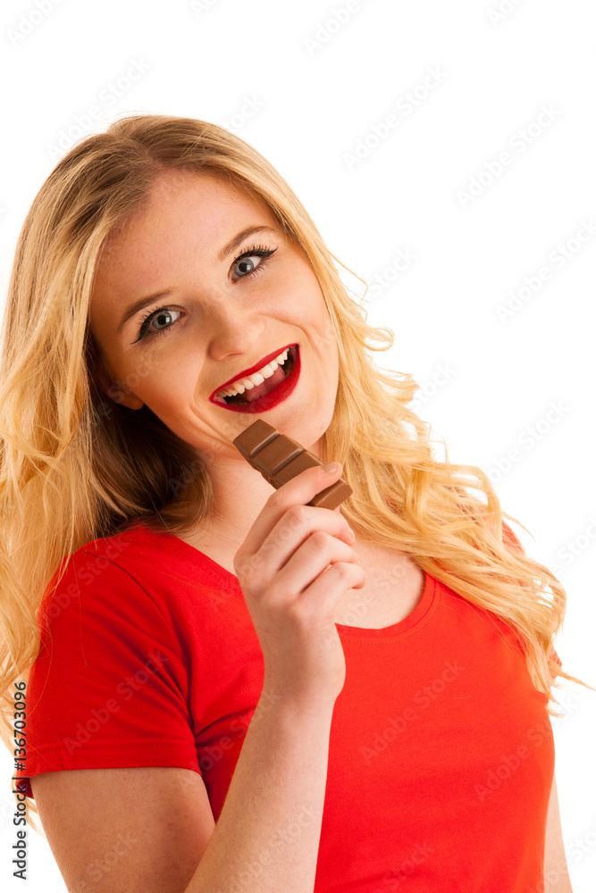 Cute young woman eating chocolate isolated over white background Cute young woman eating chocolate isolated over white background
