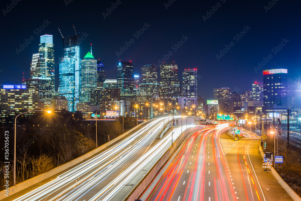 The Philadelphia skyline and Schuylkill Expressway at night, in