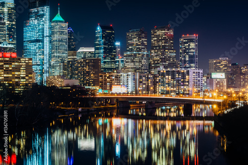 The Philadelphia skyline and Schuylkill River at night, in Phila
