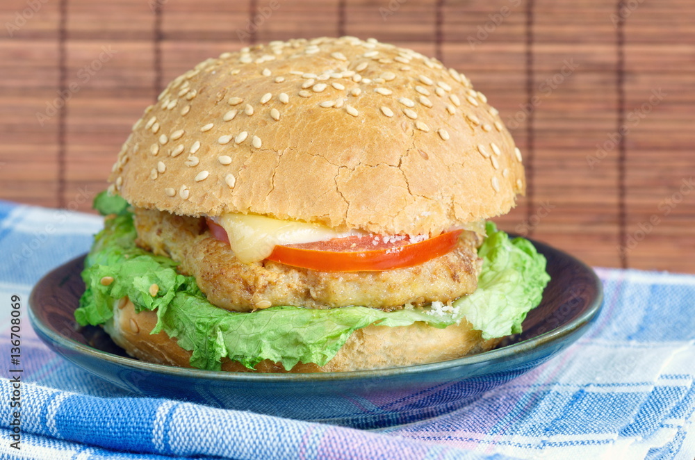 Hamburger with meat, cheese and vegetables Hamburger with meat, cheese and vegetables