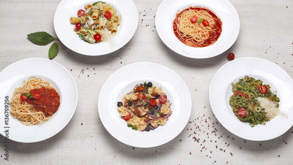 a variety of pasta on the menu of different shapes
