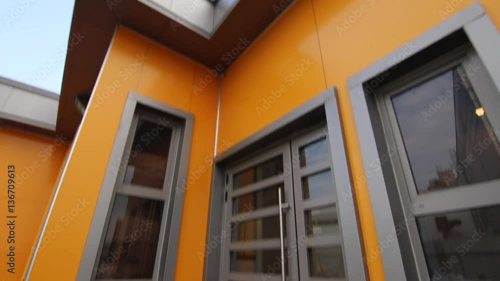Modern generic industrial structure in metal grey and orange colors Modern generic industrial structure in metal grey and orange colors