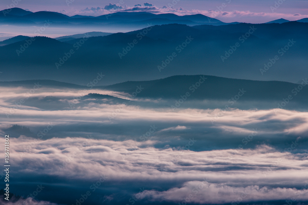 Beautiful foggy landscape in the mountains.