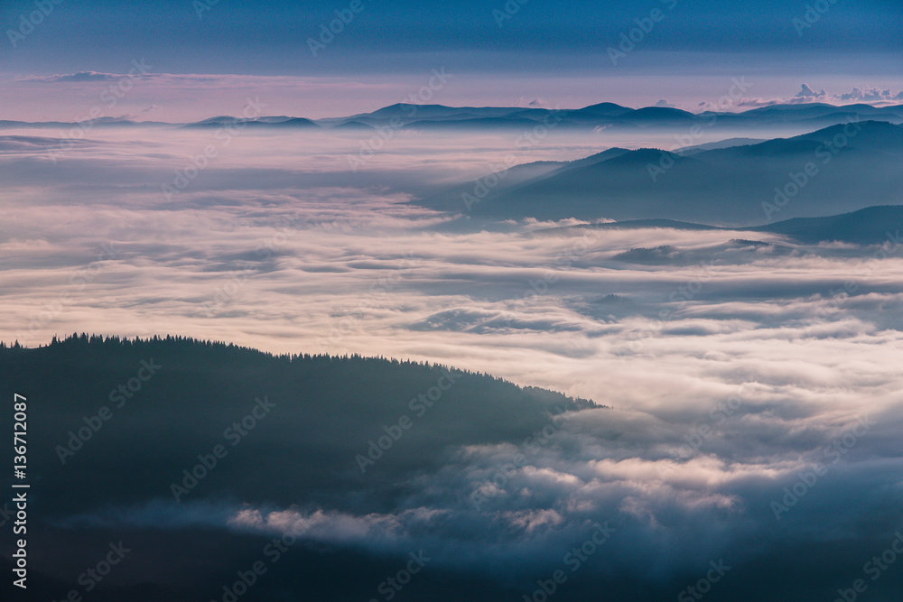 Beautiful foggy landscape in the mountains.