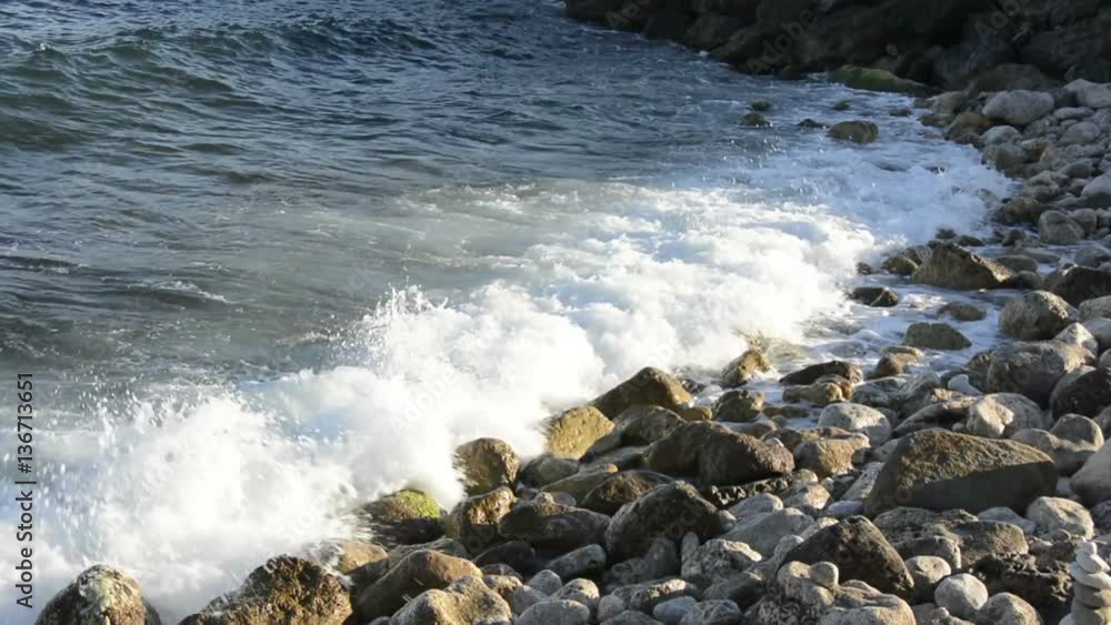 Ocean Waves Breaking On The Rocks. Ocean Waves Breaking On The Rocks.