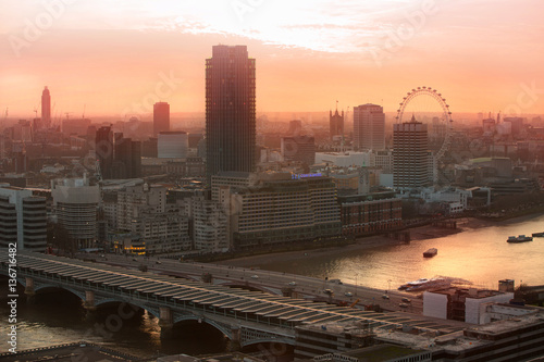 London at sunset with. View at the Westminster aria, London eye, River Thames, embankment and London bridge 