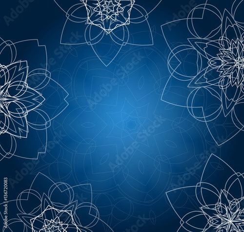 Abstract blue background with tribal floral mandalas