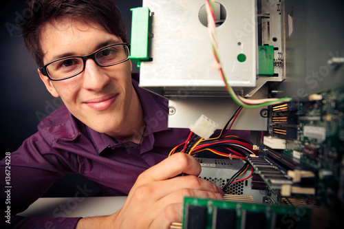 Computer Nerd Upgrading His PC photo