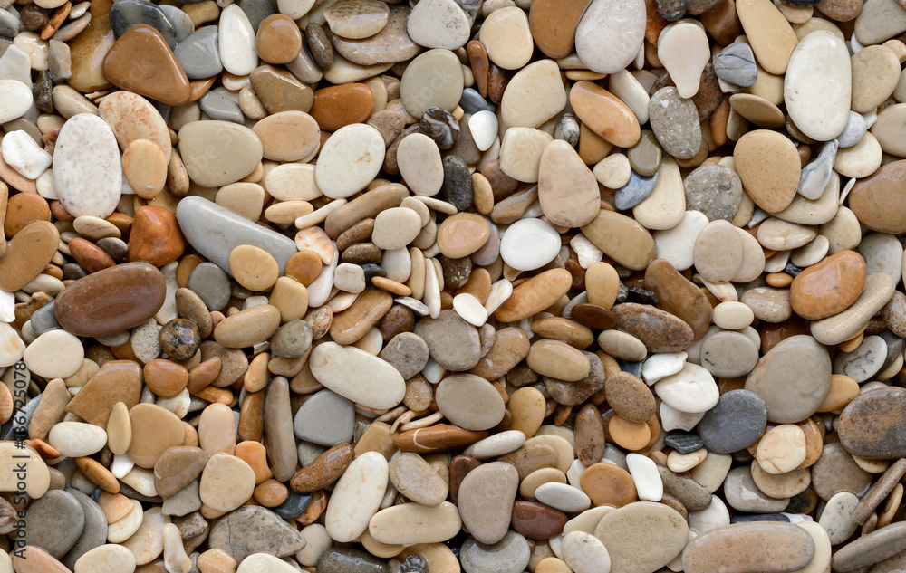 Naklejka premium Wet sea Pebbles texture or background.