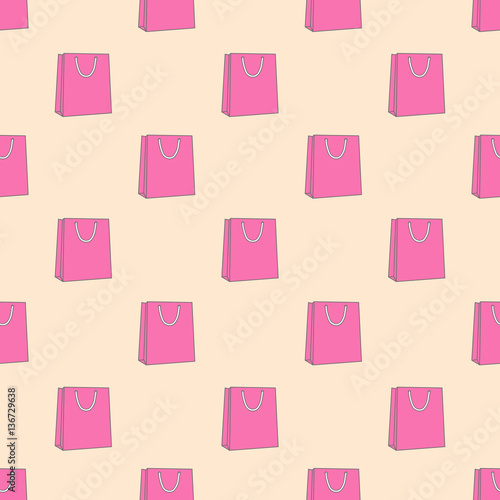 seamless pattern which shows the pink shopping bags on a yellow background © davilina2014